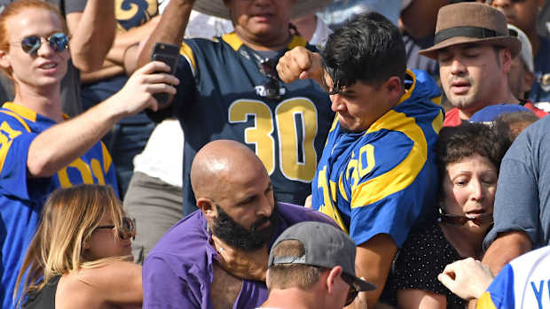 Rams fans fight in stands during NFL game